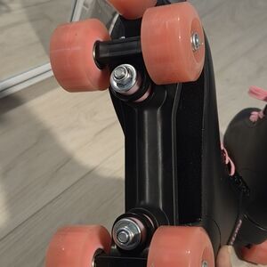 Sleek Black and Pink Roller Skates